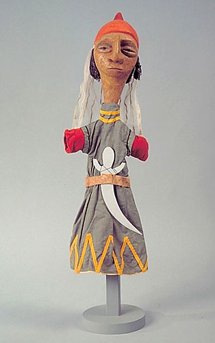 <strong>Garde maure</strong><BR>1956<BR>Pâte de bois, bois, carton, coton, nylon, velours et laine<BR>61,5 x 10 x 14 cm<BR>Photo : Musée national des beaux-arts du Québec : Patrick Altman<BR><br><br>© Succession Charles Daudelin /COVA-DAAV